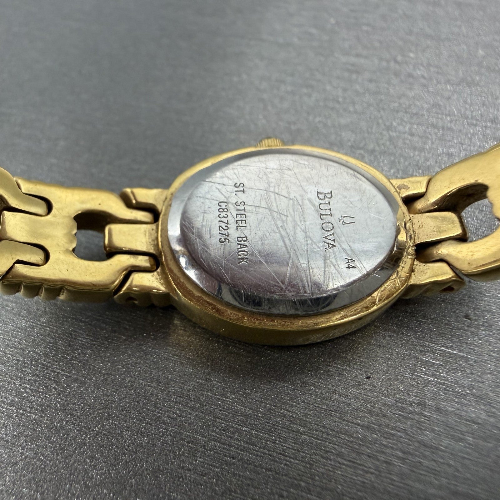 Bulova Crystal Watch Women 18mm Black Dial Gold Tone Crystal Bezel New Battery10