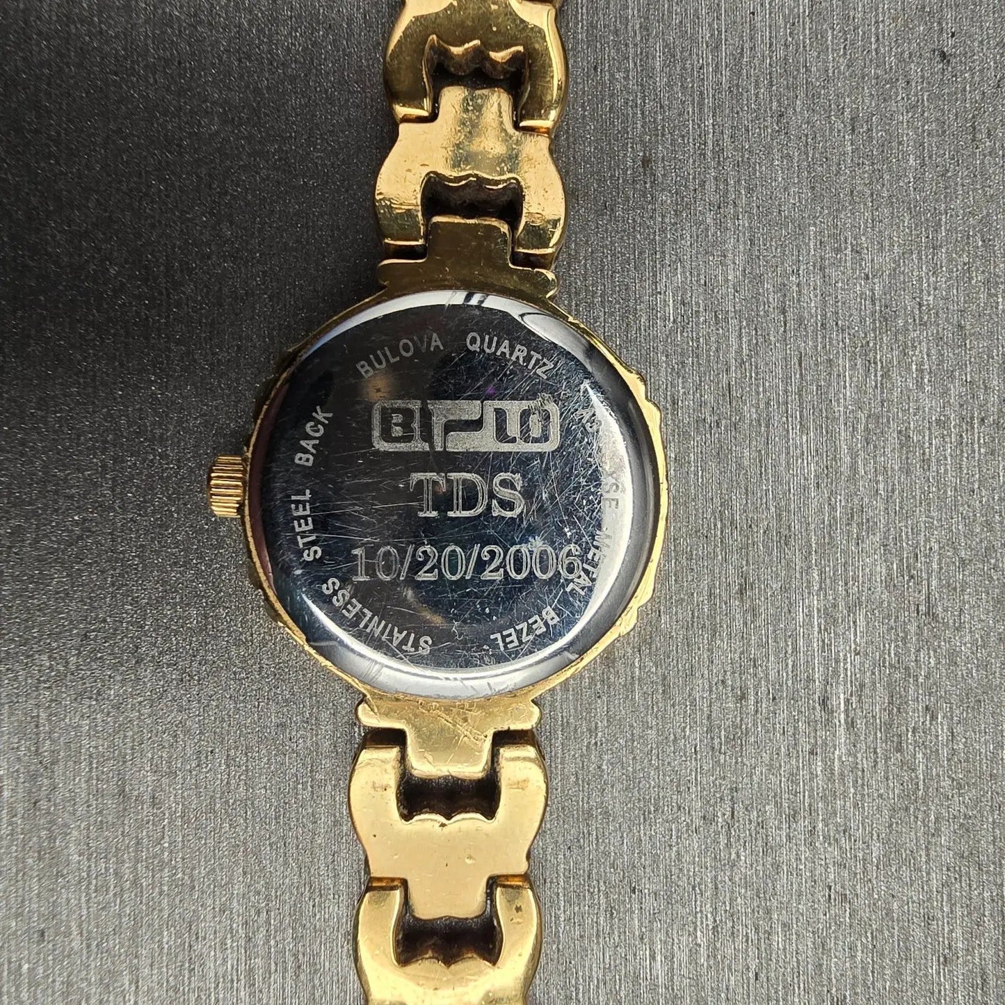 Bulova Watch Women 21mm White Dial Gold Tone Gemmed Round 98R06 New Battery10