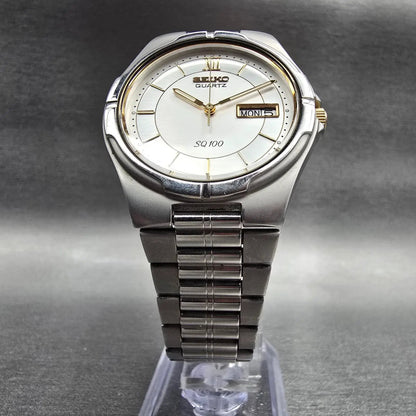 Seiko SQ 100 Watch Men 36mm Silver Dial Silver Tone Daydate 5Y23-7029 New Batt 75