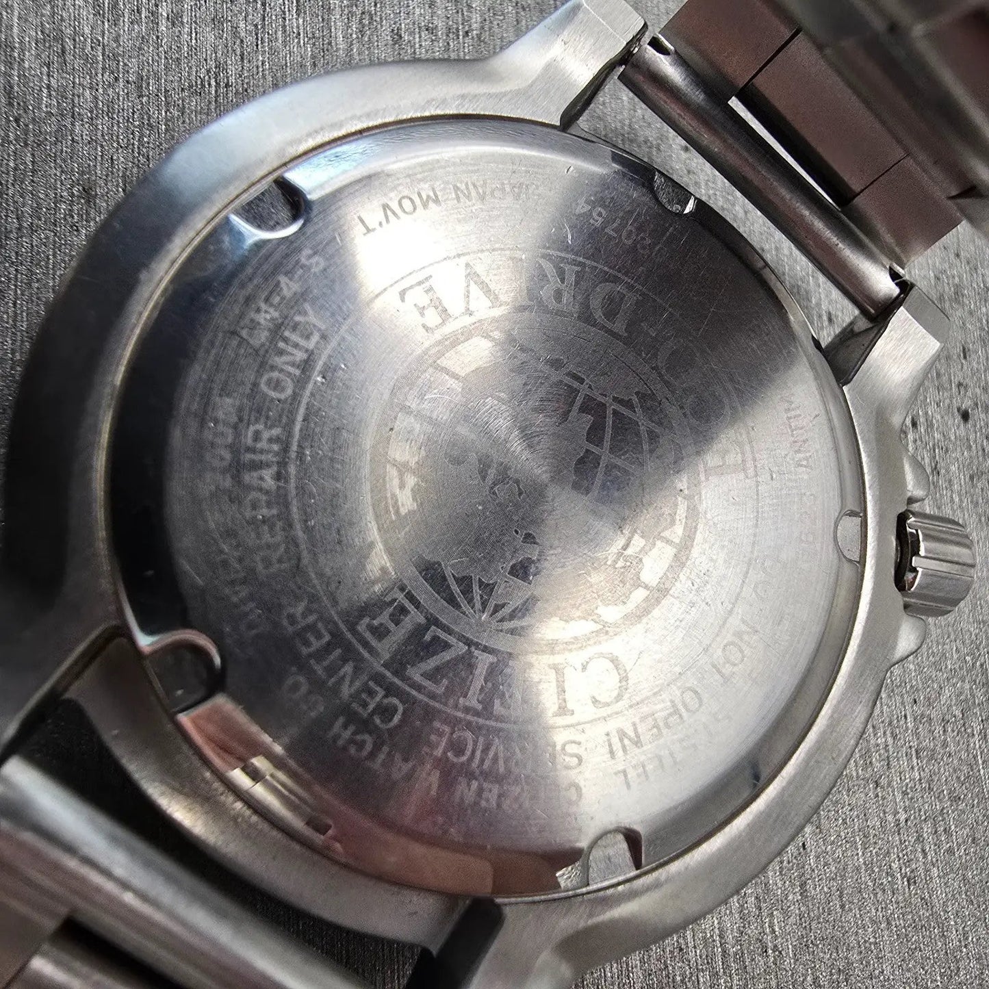 Citizen Eco-Drive Watch Men 44mm Black Dial Two Tone Date E168-S100623 Works10