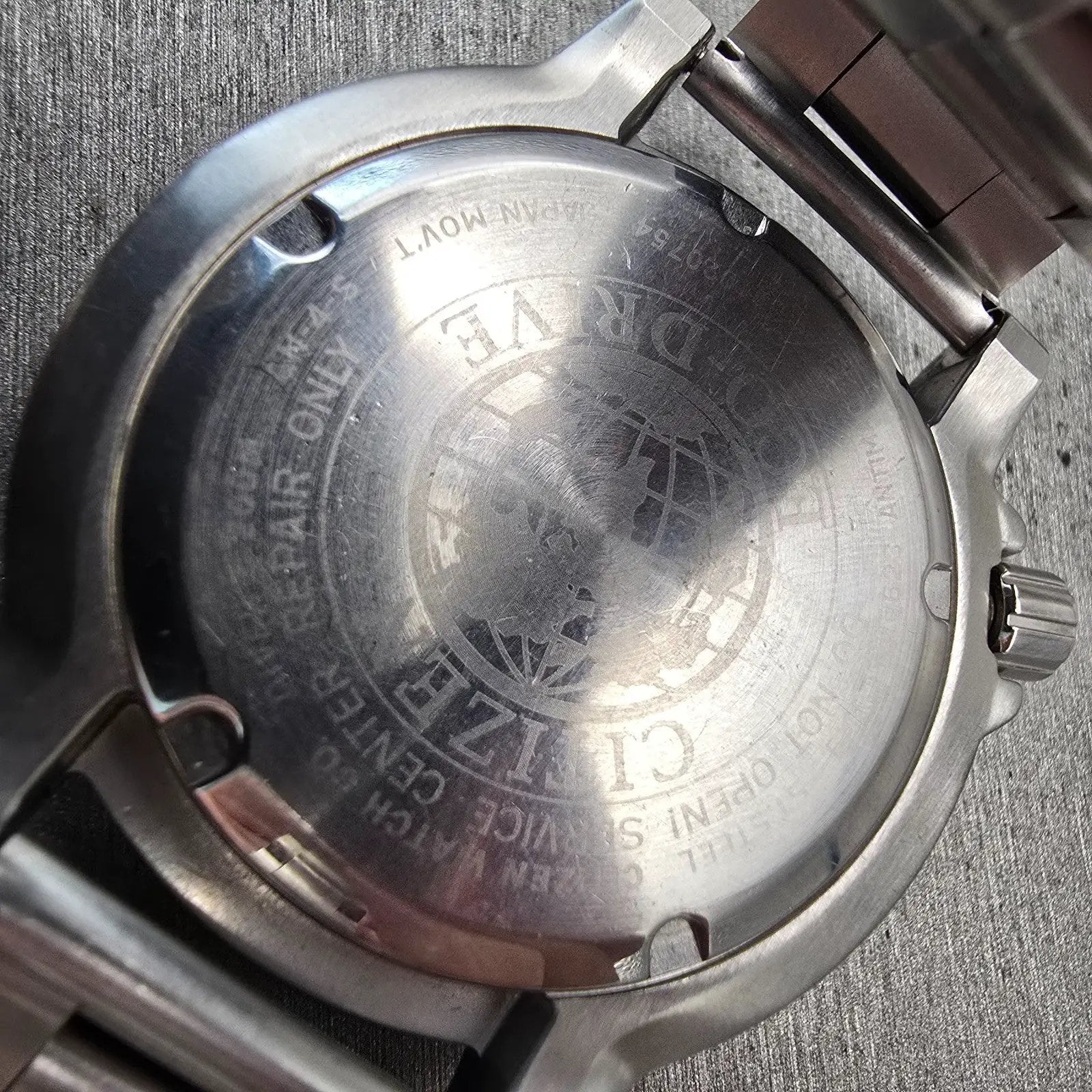Citizen Eco-Drive Watch Men 44mm Black Dial Two Tone Date E168-S100623 Works10