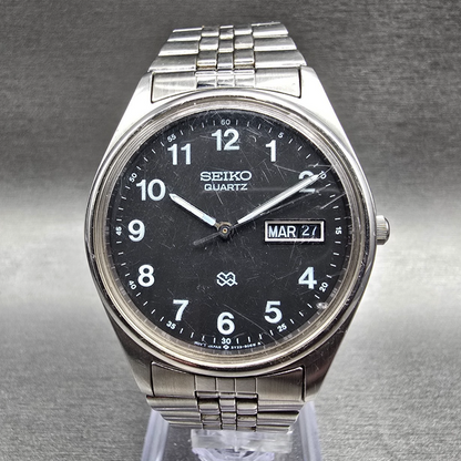 Seiko SQ Watch Men 35mm Black Dial Silver Tone Daydate Round 5Y23-8040 New Batt0
