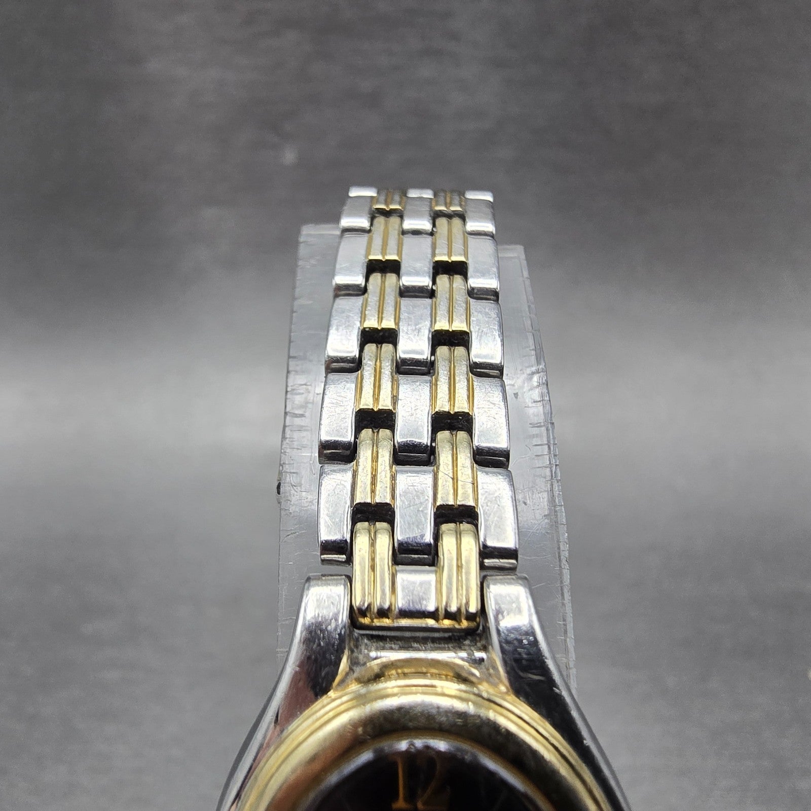 Seiko Solar Watch Women 20mm Black Dial Two Tone Oval V114-0AA0 Runs4