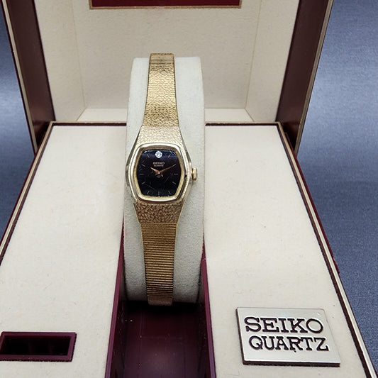 Seiko Watch Women 17mm Black Dial Gold Tone Hexagom 4N005059 New Battery0