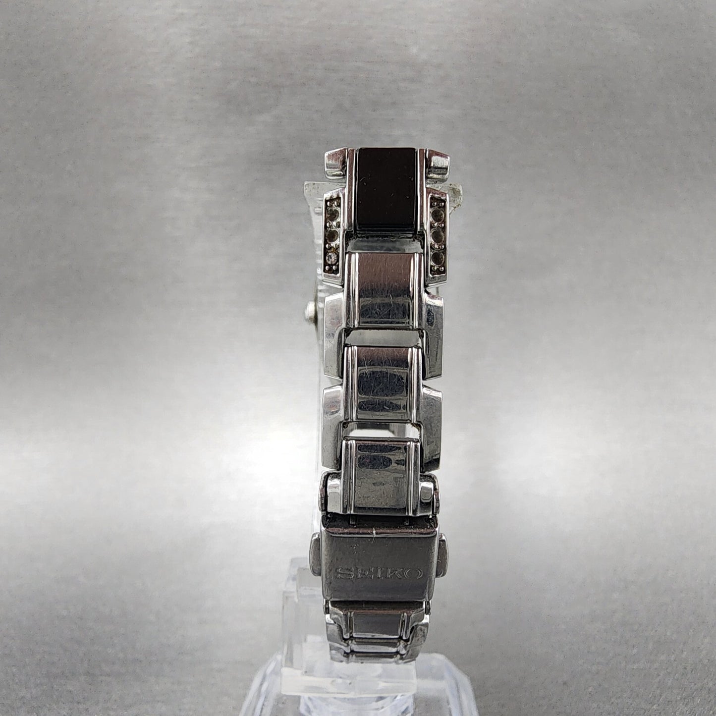 Seiko Solar Watch Women 19mm Black Dial Silver Tone Crystal Accent Runs V1150AY07