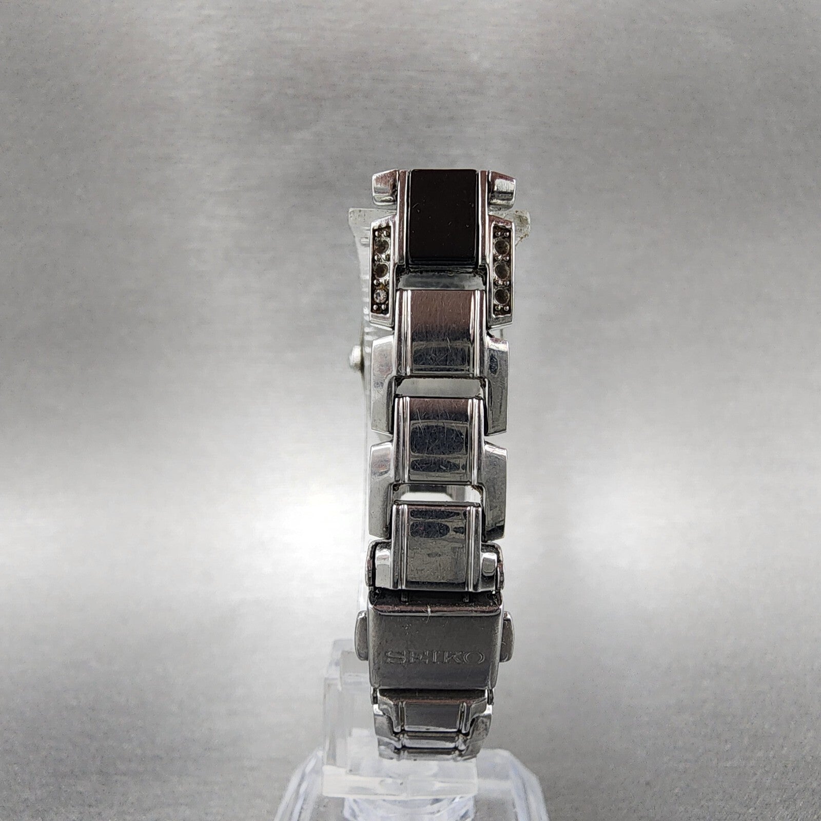 Seiko Solar Watch Women 19mm Black Dial Silver Tone Crystal Accent Runs V1150AY07