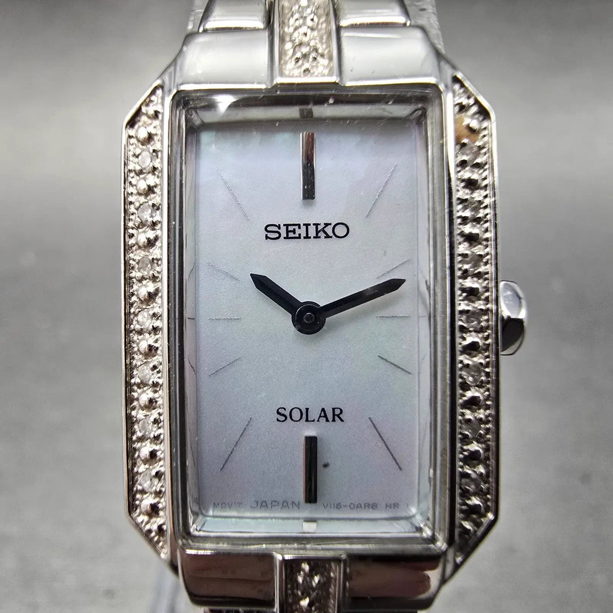 Seiko Solar Watch Women 17mm MOP Dial Steel Rectangle Crystals V116-0AF0 Works1