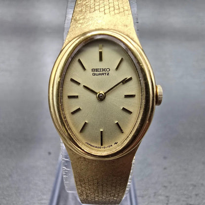 Seiko Watch Women 18mm Champagne Dial Gold Tone Oval 1400-5089 New Battery VTG1