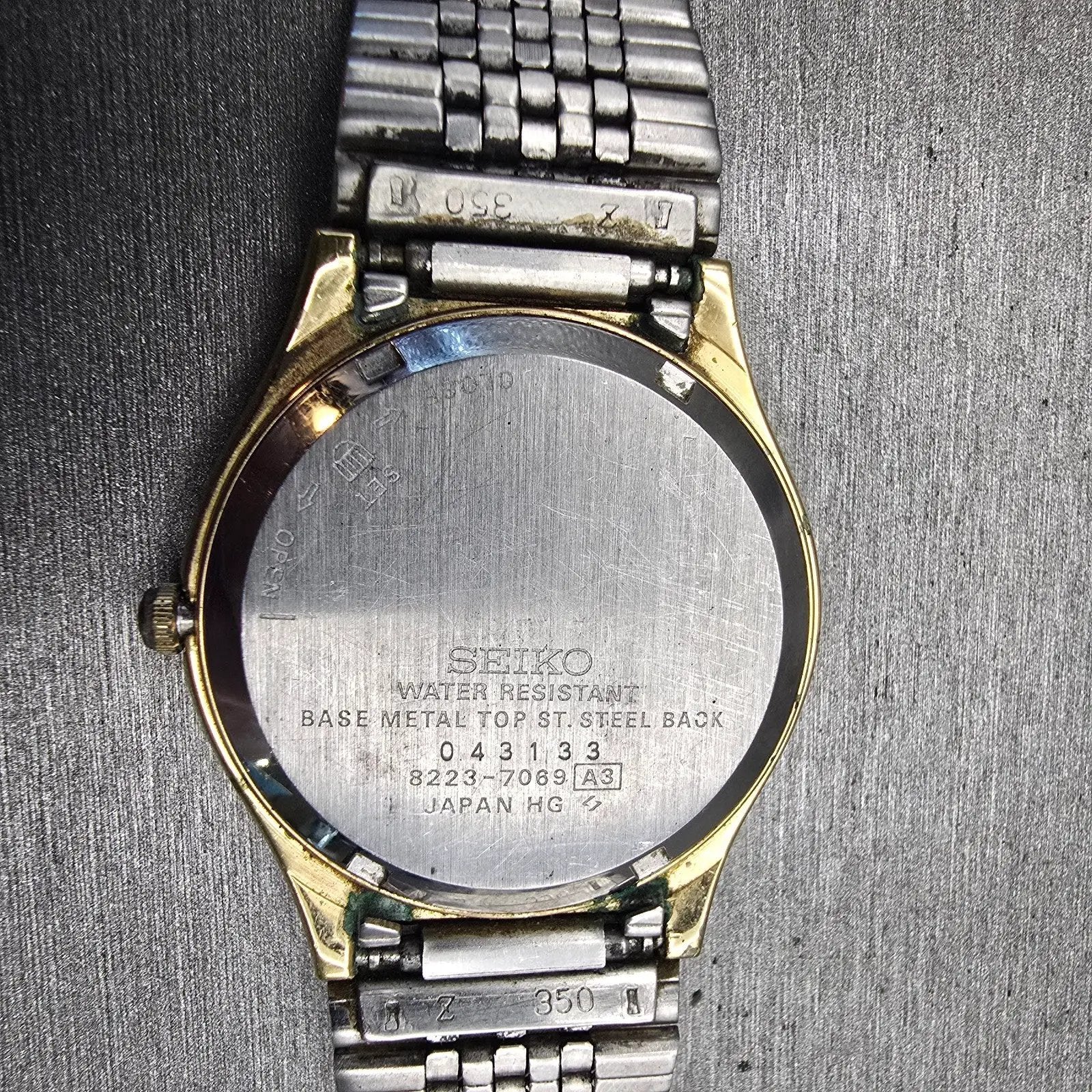Seiko SQ Watch Men 33mm Champagne Dial Gold Tone Daydate Round 8223-7089 New Bat10