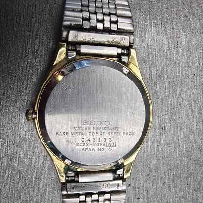 Seiko SQ Watch Men 33mm Champagne Dial Gold Tone Daydate Round 8223-7089 New Bat10