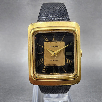 Movado Tank Watch Women 22mm Black & Gold Dial Gold Tone Rectangle New Battery0