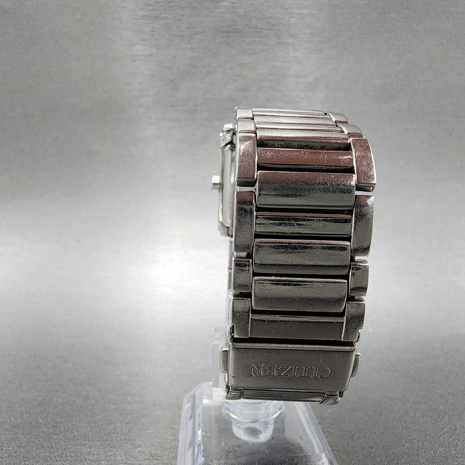Citizen EcoDrive Tank Watch Women 26mm White Dial Silver Tone Date Runs7