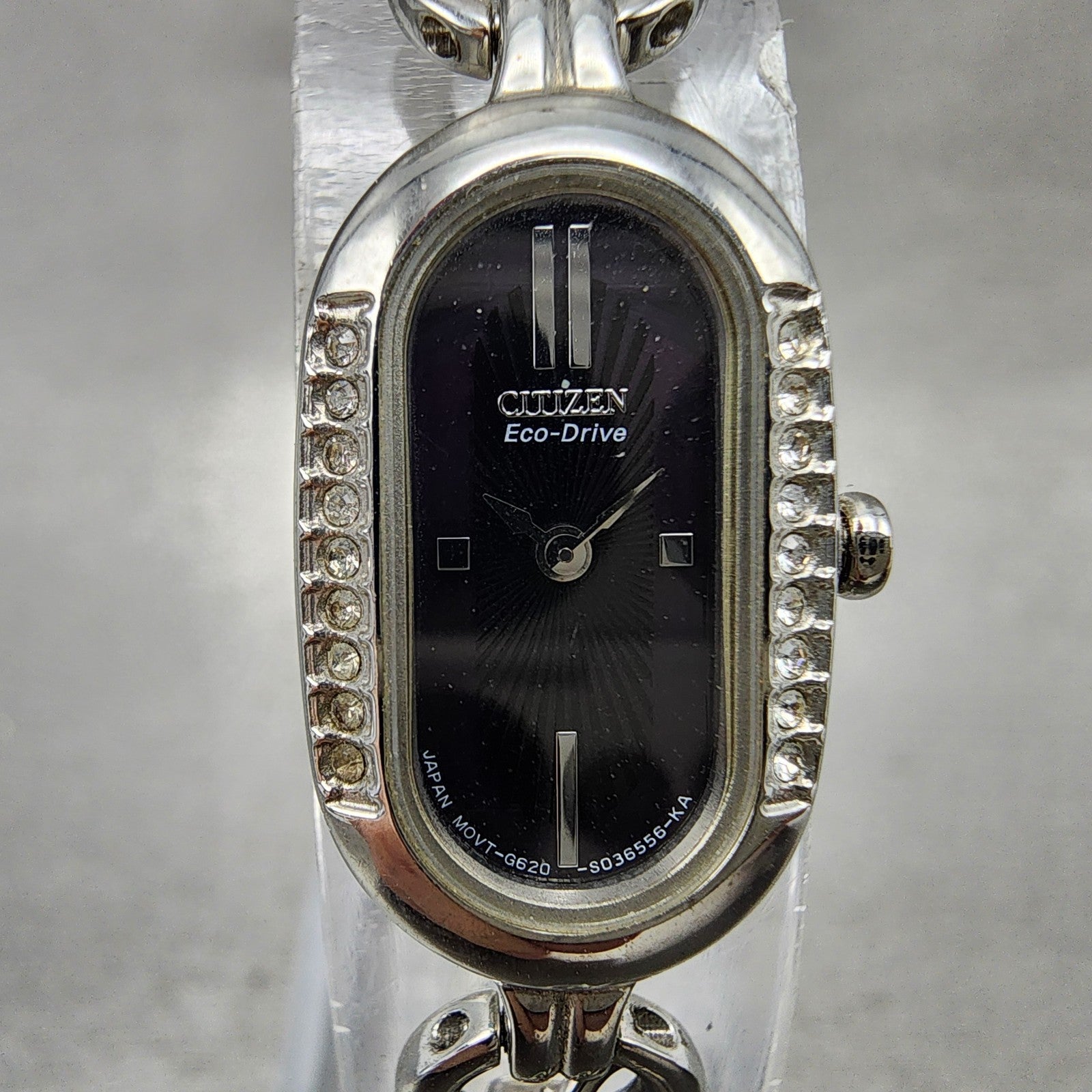 Citizen EcoDrive Watch Women 14mm Black Dial Silver Tone Oval Crystal Bezel1