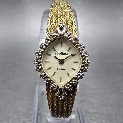 Armitron Watch Women 15mm Cream Dial Gold Tone Diamond bezel Oval New Battery0