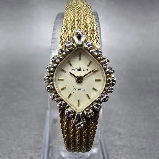 Armitron Watch Women 15mm Cream Dial Gold Tone Diamond bezel Oval New Battery0