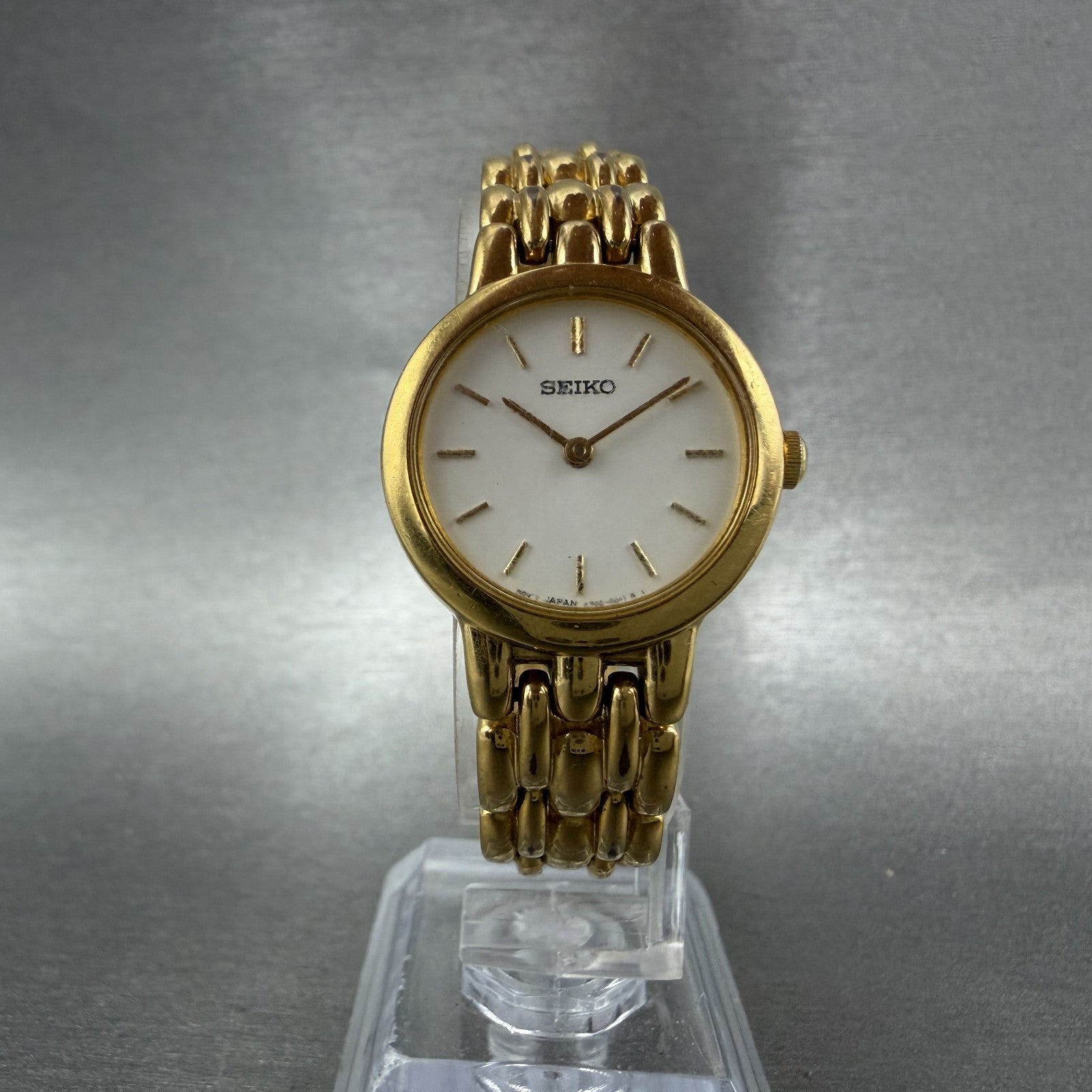 Seiko Watch Women 24mm White Dial Gold Tone Round V700-6389 New Battery ABC5