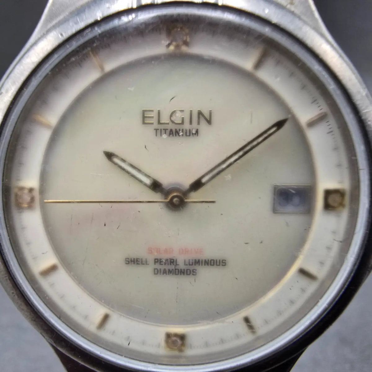 Elgin Solar Watch Men 35mm MOP Dial Titanium Date Round FK-1066 Runs READ!!!!1
