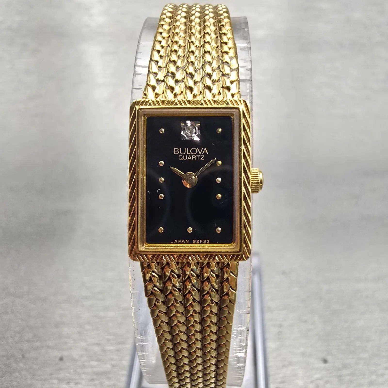 Bulova Watch Women 13mm Black Dial Gold Tone Rectangle 92F33 New Battery Vintage0