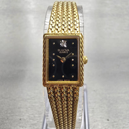 Bulova Watch Women 13mm Black Dial Gold Tone Rectangle 92F33 New Battery Vintage0