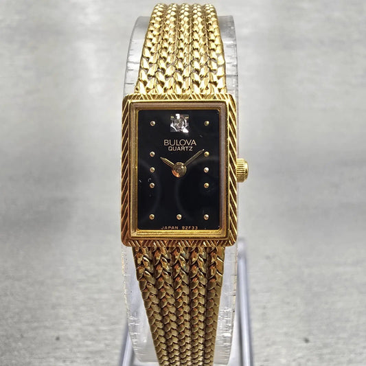 Bulova Watch Women 13mm Black Dial Gold Tone Rectangle 92F33 New Battery Vintage0