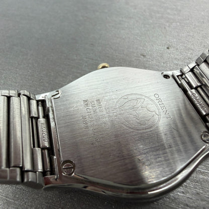Orient  Cygnus Swimmer Watch Unisex 33mm Champagne Dial Silver Tone New Battery9