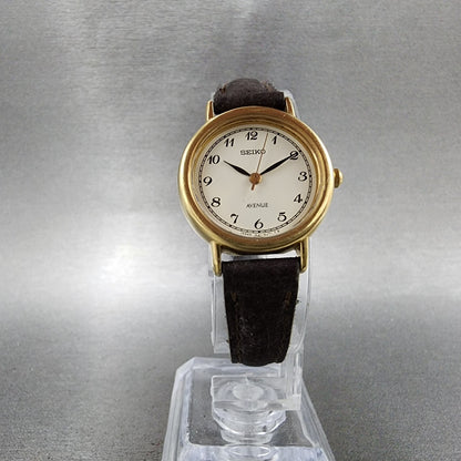 Seiko Avenue Watch Women 23mm White Dial Gold Tone Round 1F210C40 New Battery6