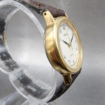 Seiko Avenue Watch Women 23mm White Dial Gold Tone Round 1F210C40 New Battery4