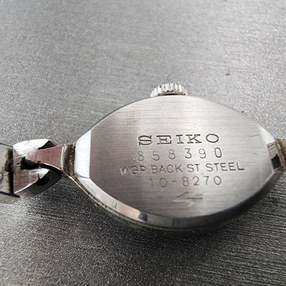 Seiko Solar Watch Women 14mm Silver Dial White Gold Plated Oval Manual Wind Runs9