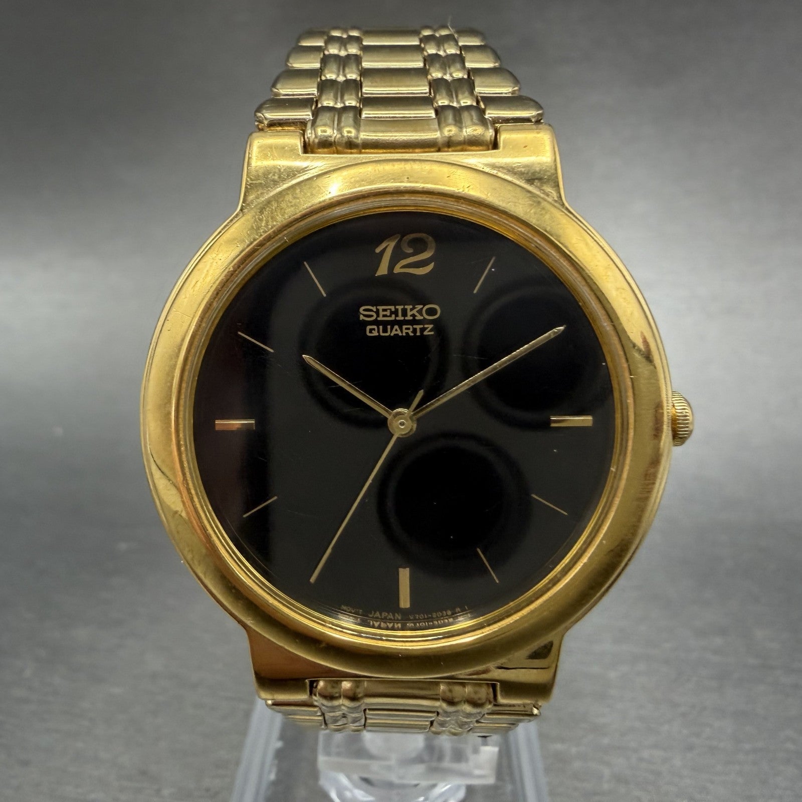 Seiko Watch Men 33mm Black Dial Gold Tone Round Vintage V701-1T79 PARTS0