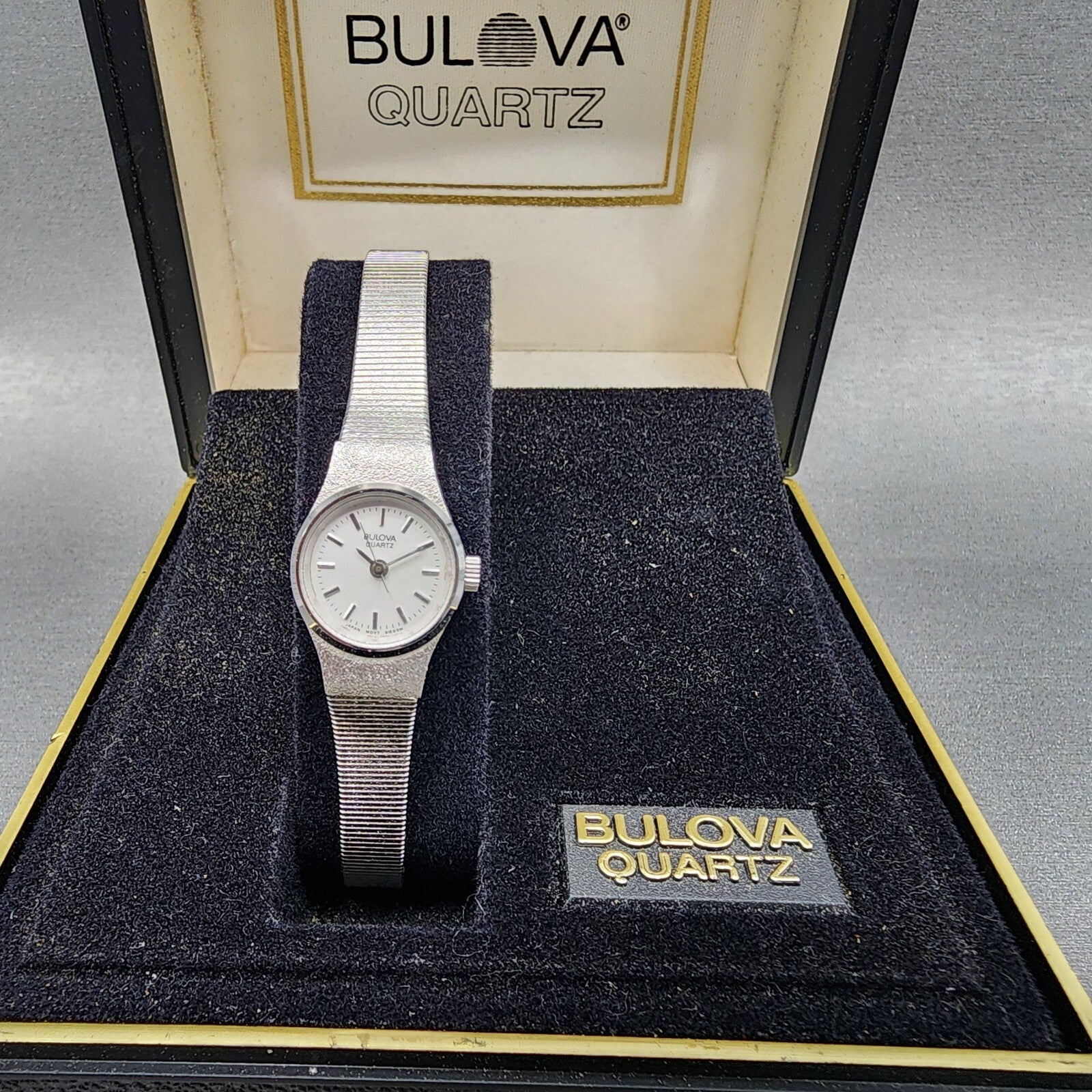 Bulova Watch Women 17mm White Dial Stainless Steel Round 91E03W New Battery NOS0