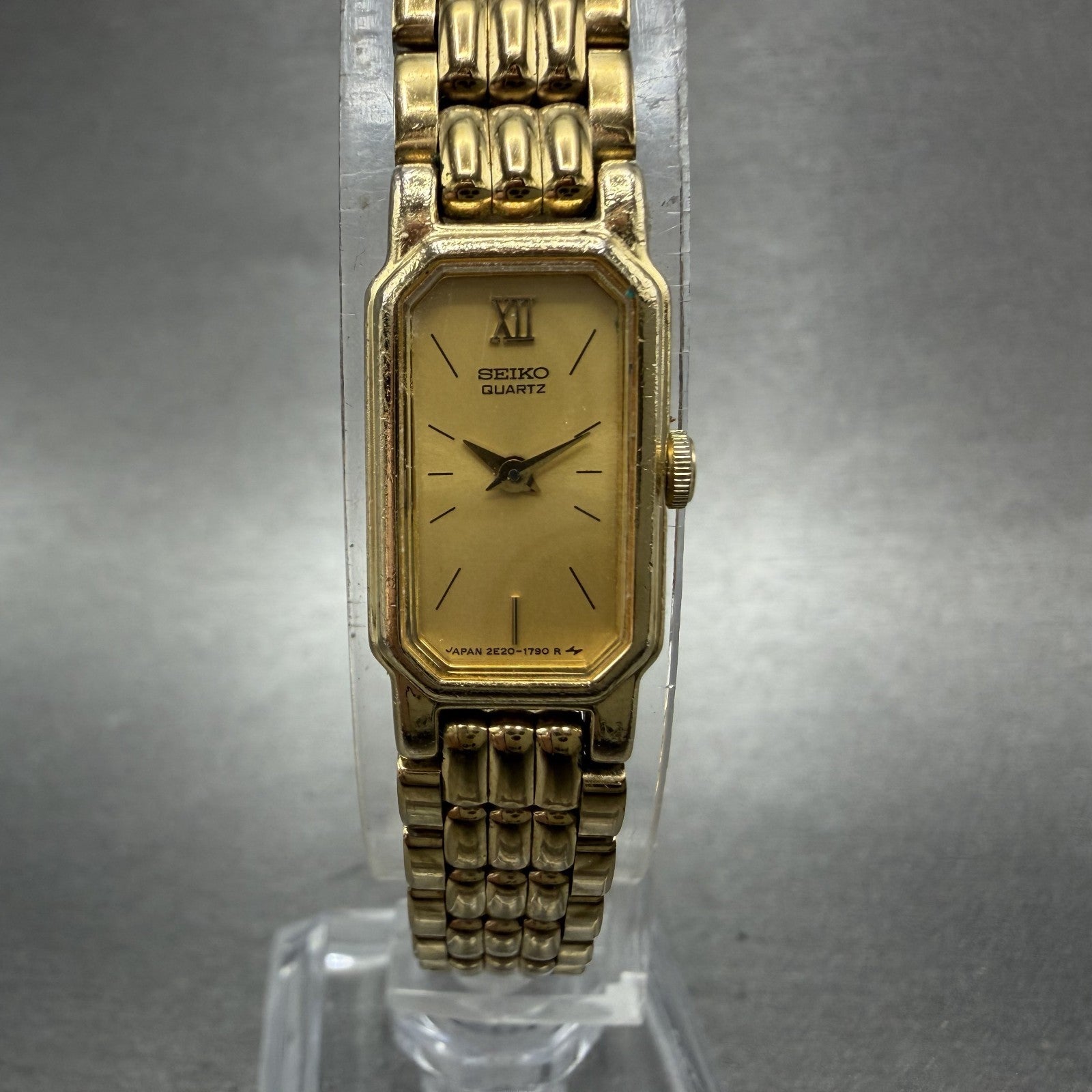 Seiko tank Watch Women 12mm Champagne Dial Gold Tone 2e206389 New Battery0