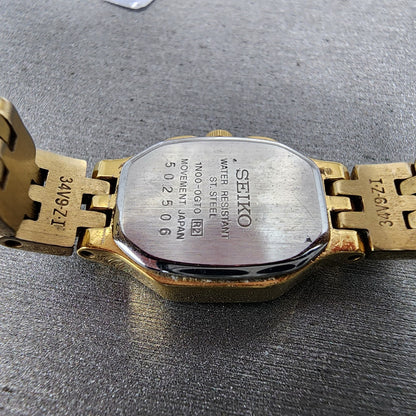 Seiko Watch Women 16mm Champange Dial Gold Tone Hexagon 1N000GT0 New Battery9