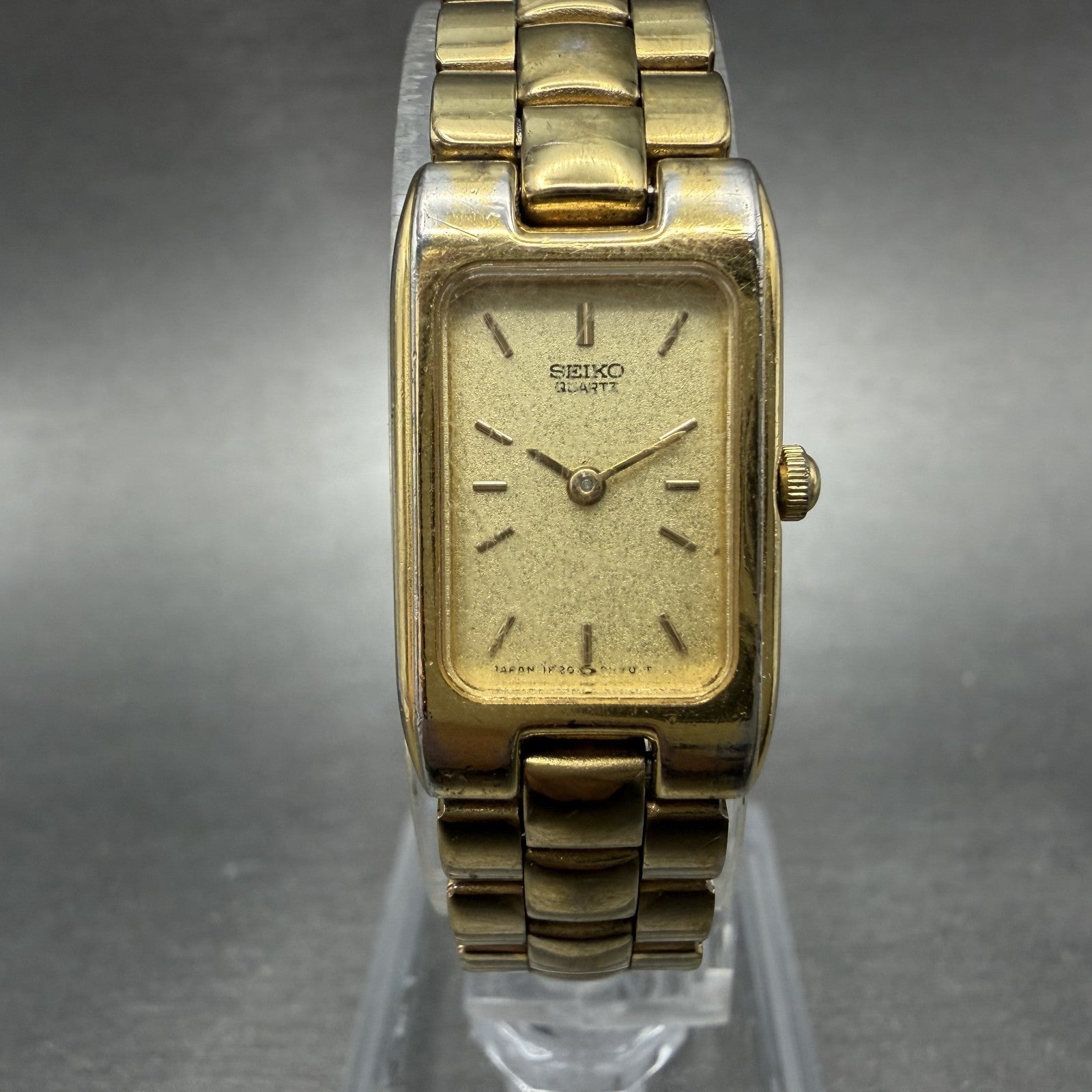 Seiko Tank Watch Women 15mm Champagne Dial Gold Tone Rectangle 1F20-5D99 New Bat0