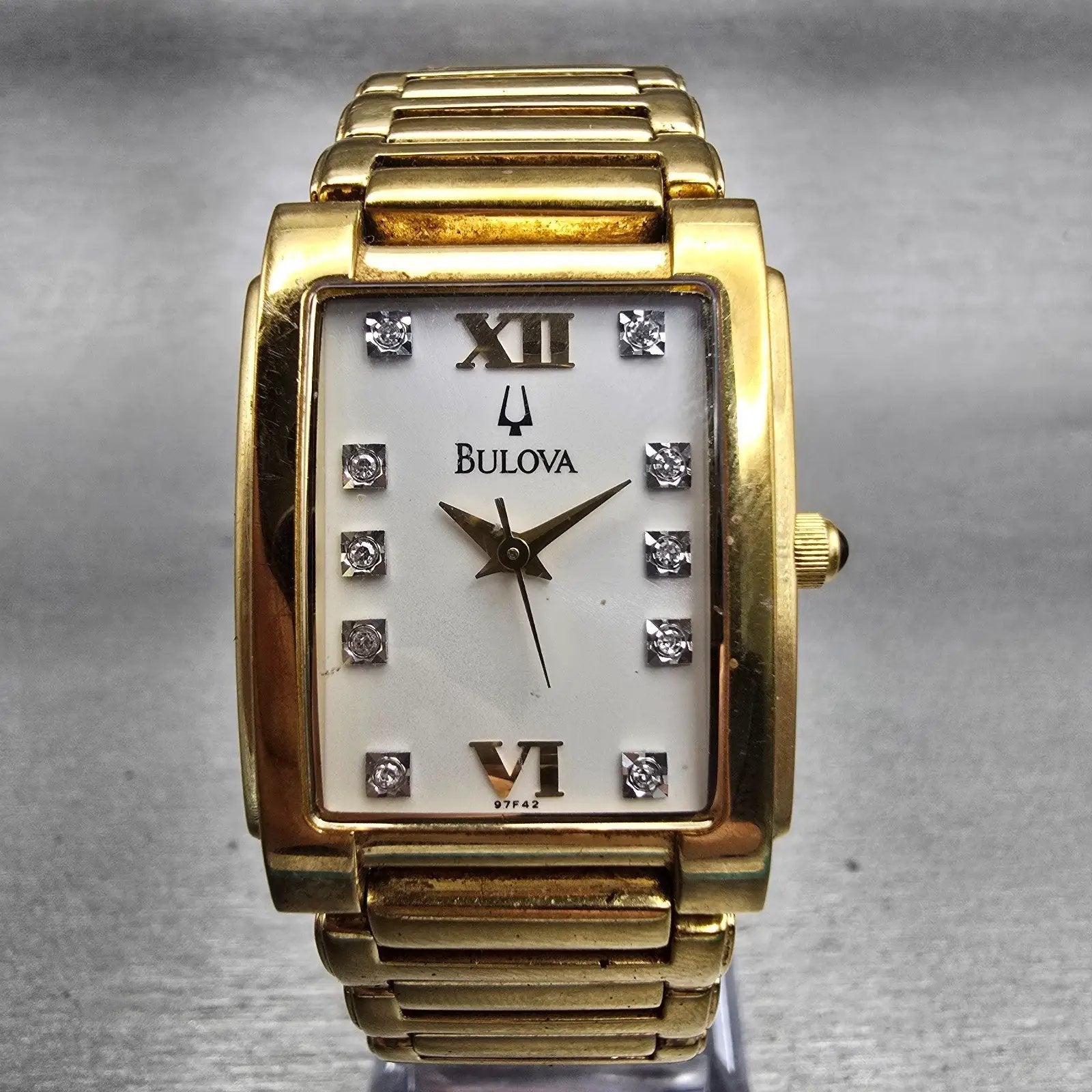 Bulova Watch Men 25mm White Dial Gold Tone Gemmed Rectangle 97F42 New Battery0