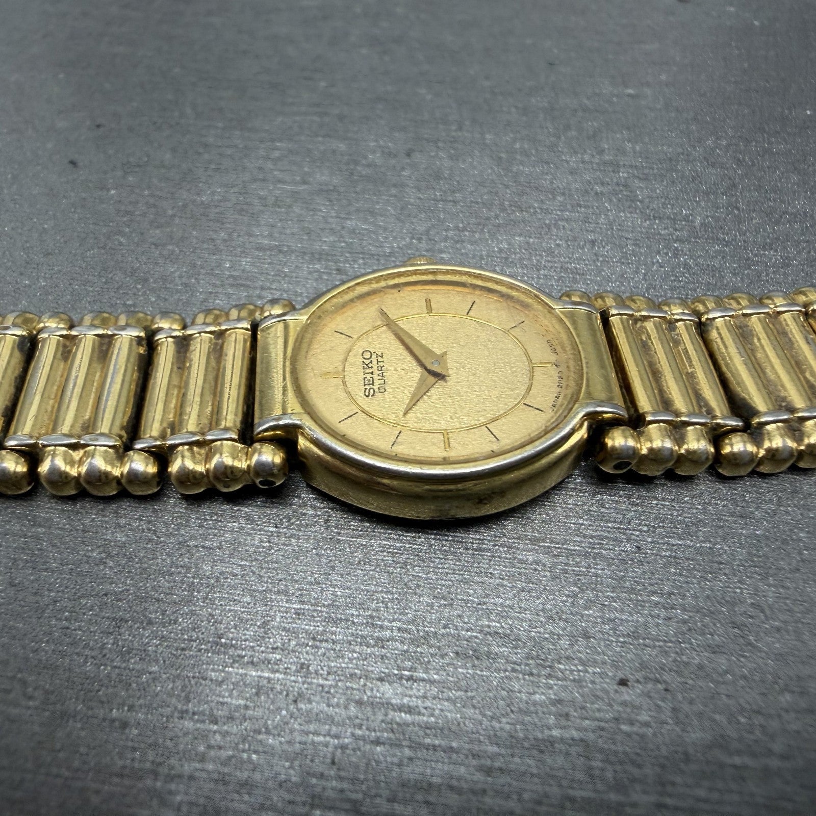 Seiko Watch Women 18mm Gold Dial Gold Tone Oval BROKEN BAND 2P205E29 New Batt5