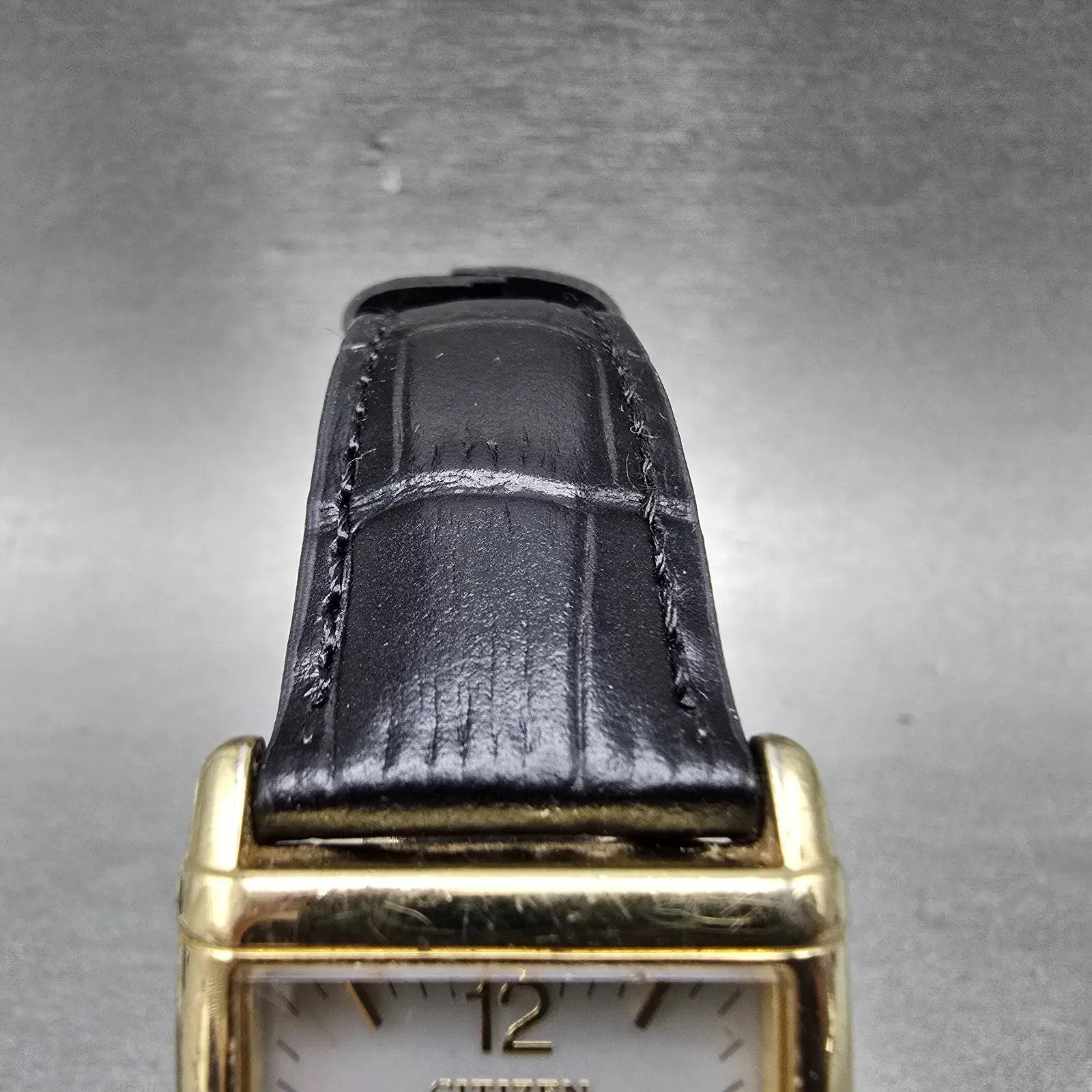 Citizen Eco-Drive Tank Watch Men 25mm Silver Dial Gold Tone Rectangle Date RunsP4