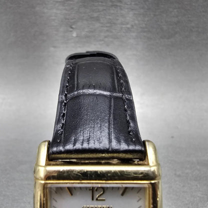 Citizen Eco-Drive Tank Watch Men 25mm Silver Dial Gold Tone Rectangle Date RunsP4