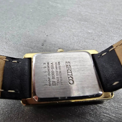 Seiko Solar Tank Watch Women 18mm White Dial Gold Tone V115-0BD0 Rectangle Runs9