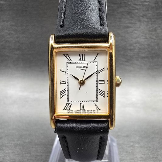 Seiko Tank Watch Women 18mm White Dial Gold Tone Rectangle 1N01-5A40 New Battery0