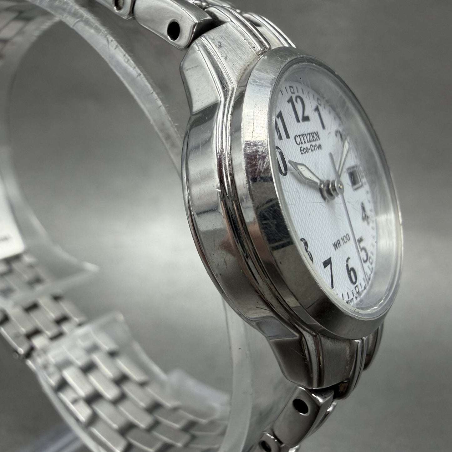 Citizen EcoDrive Watch Women 25mm White Dial Silver Tone Date E011S06489 Runs3