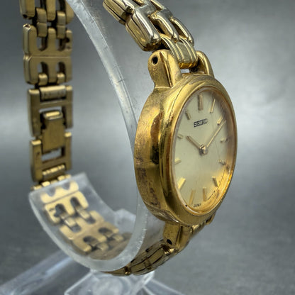 Seiko Watch Women 21mm Champagne Dial Gold Tone Round 1N00-1E09 New Battery BD73