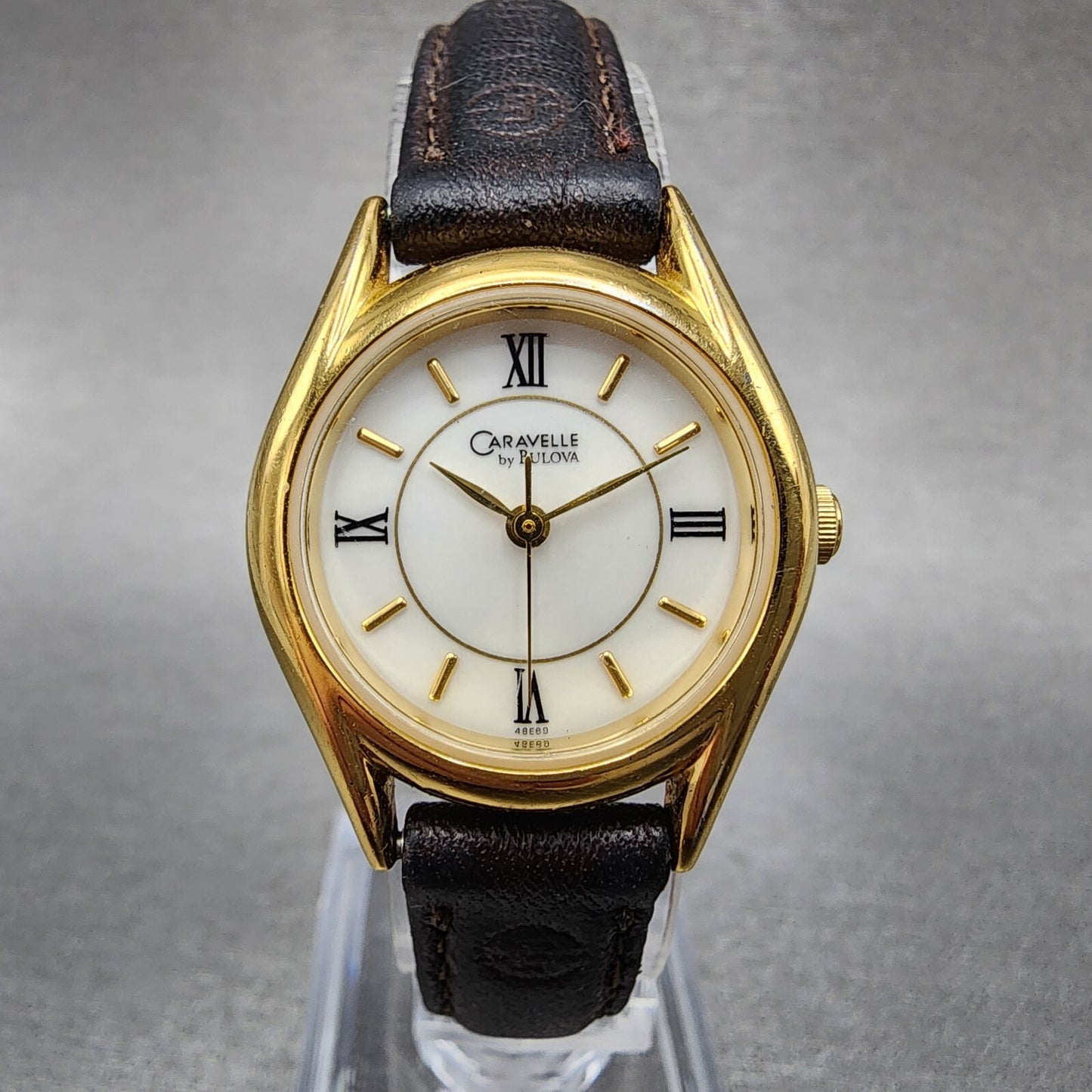 Bulova Caravelle Watch Women 24mm White Dial Gold Tone Round 48E69 New Battery0