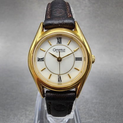 Bulova Caravelle Watch Women 24mm White Dial Gold Tone Round 48E69 New Battery0