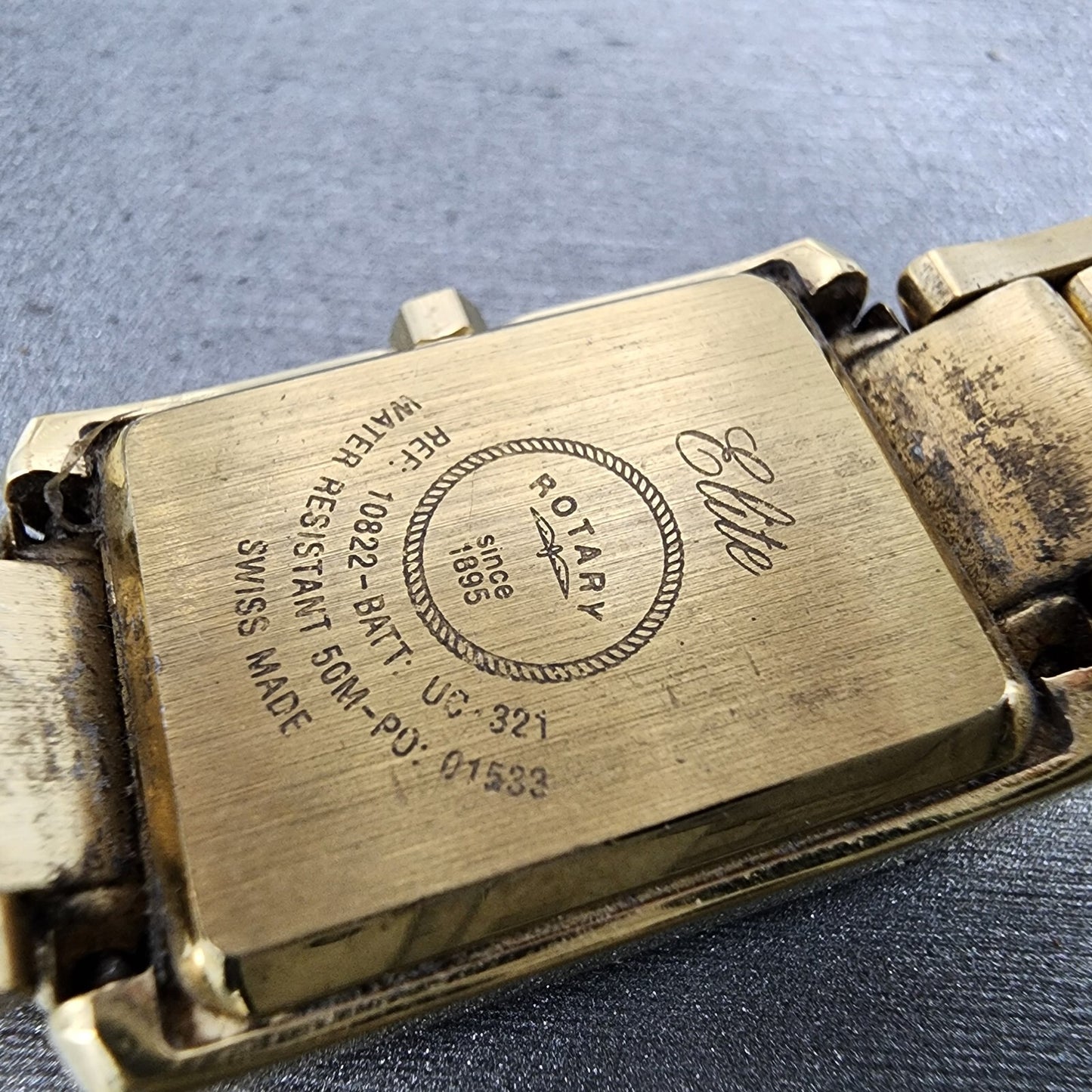 Rotary Elite Tank Watch Women 20mm White Dial Gold Tone Rectangle New Battery