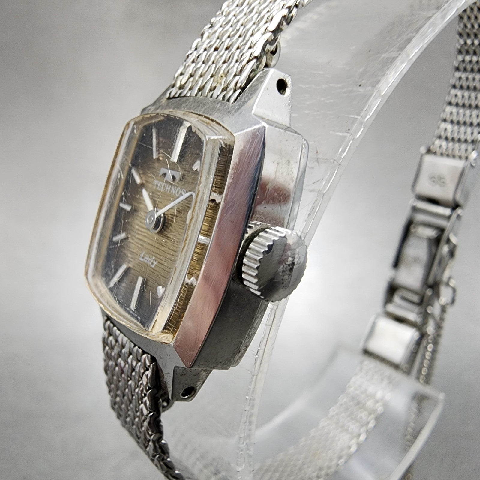 Technos Tank Watch Women 16mm Gold Dial Silver Tone Rectangle Manual Wind Runs2