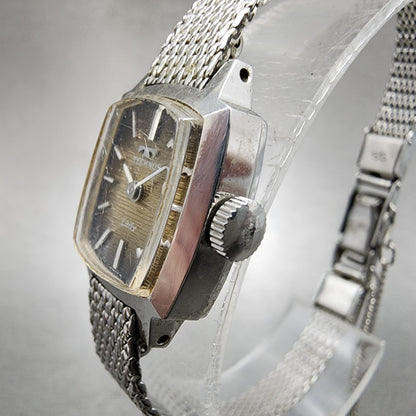 Technos Tank Watch Women 16mm Gold Dial Silver Tone Rectangle Manual Wind Runs2