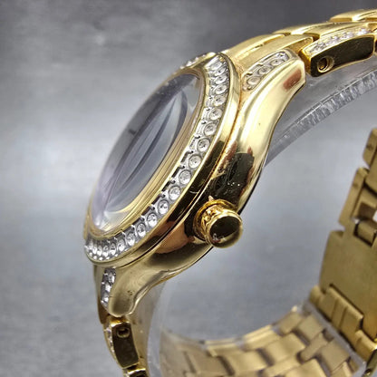 Citizen Eco-Drive Watch Women 28mm Silver Dial Gold Tone Round FE2062-58A Runs2