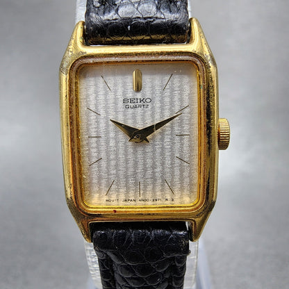 Seiko Tank Watch Women 17mm Silver Dial Gold Tone Rectangle 4N005121 New Batt1