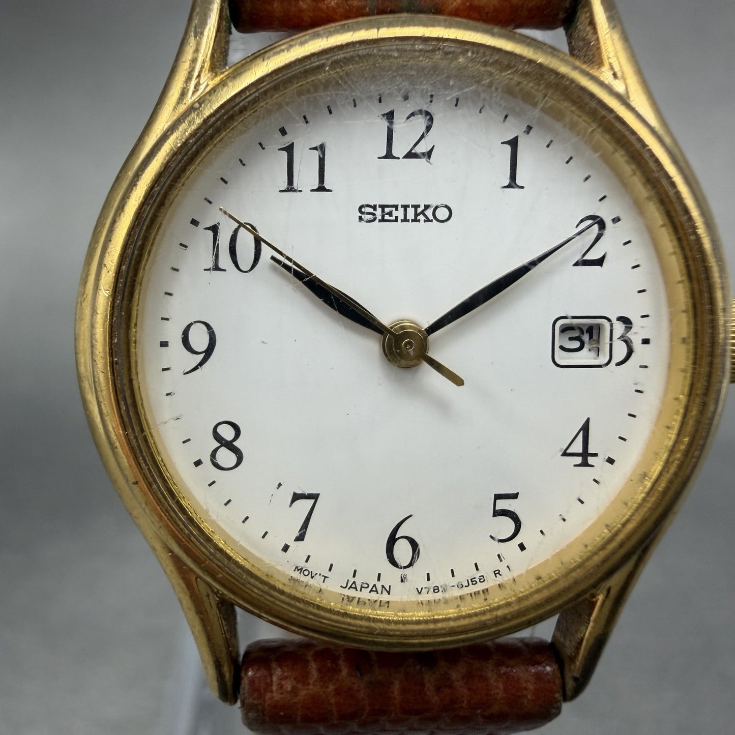 Seiko Watch Women 25mm White Dial Gold Tone Date Round V782-6E50 New Battery1