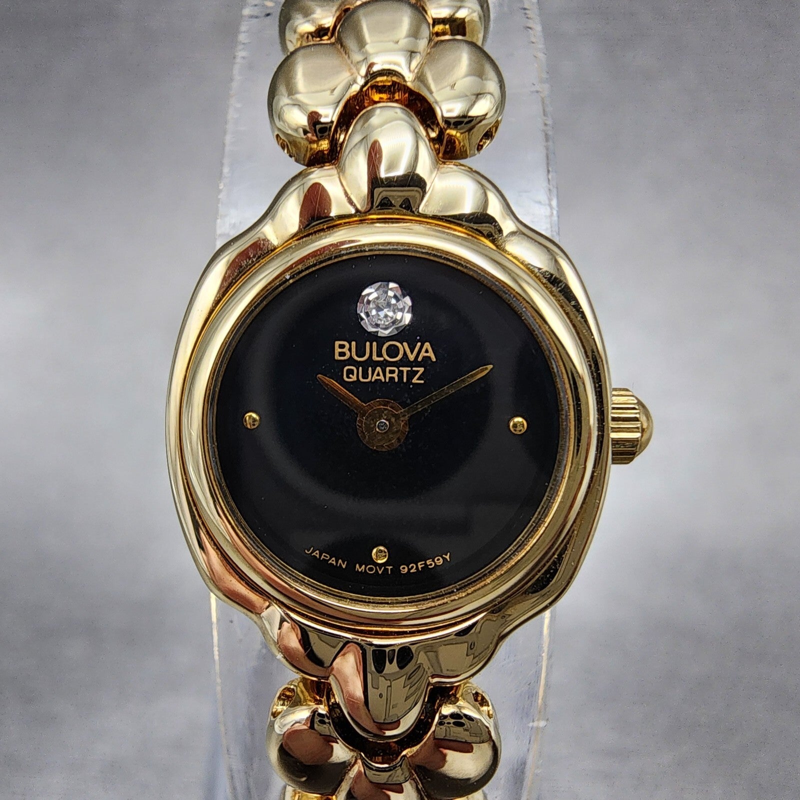 Bulova Watch Women 17mm Black Dial Gold Tone Round 92F59 New Batt NOS3